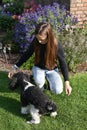 Girl and her poodle dog Royalty Free Stock Photo