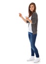 Teenage girl pointing to the side Royalty Free Stock Photo