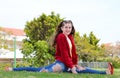 A teenage girl preforming split on the lawn Royalty Free Stock Photo