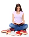 Teenage girl reading books Royalty Free Stock Photo