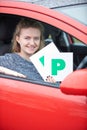 Teenage Girl Recently Passed Driving Test Holding P Plates