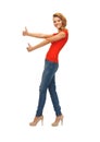 Teenage girl in red t-shirt showing thumbs up Royalty Free Stock Photo