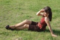 Teenage girl relaxing on grass Royalty Free Stock Photo