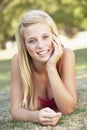 Teenage Girl Relaxing In Park Royalty Free Stock Photo