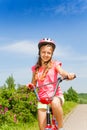 Teenage girl ride bicycle Royalty Free Stock Photo