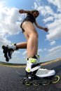 Teenage girl on roller skates. Royalty Free Stock Photo