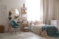 Teenage girl`s bedroom interior with stylish furniture. Idea for design Royalty Free Stock Photo