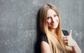 Teenage girl showing thumbs up Royalty Free Stock Photo