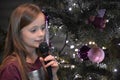 Girl sings christmas songs