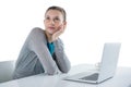 Teenage girl sitting against white background Royalty Free Stock Photo