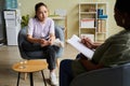 Girl having consultation with psychologist Royalty Free Stock Photo