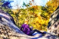 Teenage Girl Sitting on Rocks at Kent Falls