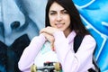 Teenage girl with a skate board outdoor Royalty Free Stock Photo