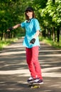 Teenage girl with skateboard Royalty Free Stock Photo