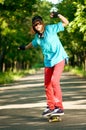 Teenage girl with skateboard Royalty Free Stock Photo