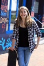 Teenage girl with skateboard