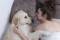 Teenage girl sleeping with her dog. Royalty Free Stock Photo