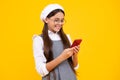 Teenage girl with smart phone. Portrait of teen child using mobile phone, cell web app. Happy face, positive and smiling Royalty Free Stock Photo