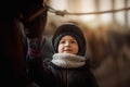 Teenage girl standing with horse in a stable Royalty Free Stock Photo