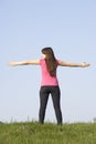 Teenage Girl Standing In Summer Meadow Royalty Free Stock Photo