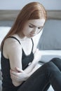 Teenage girl with stomach pain Royalty Free Stock Photo