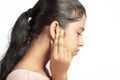 teenage girl suffering pain in the eardrum