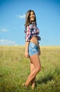 Teenage girl on summer field Royalty Free Stock Photo
