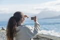 Teenage girl taking a selfie with her phone in Alaska Royalty Free Stock Photo