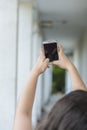 Teenage girl taking a selfie with her phone Royalty Free Stock Photo