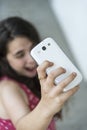 Teenage girl taking a selfie with her phone Royalty Free Stock Photo