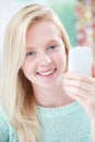 Teenage Girl Taking Selfie On Mobile Phone Royalty Free Stock Photo