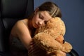 Teenage girl with a teddy bear Royalty Free Stock Photo