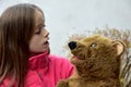 Teenage girl with teddy bear Royalty Free Stock Photo