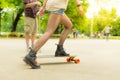 Teenage girl urban long board riding.