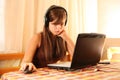 Teenage girl using laptop Royalty Free Stock Photo