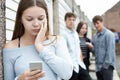 Teenage Girl Victim Of Bullying By Text Messaging Royalty Free Stock Photo