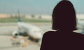 Teenage girl is waiting for her flight Royalty Free Stock Photo