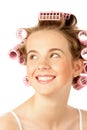 Teenage girl wearing hair curlers Royalty Free Stock Photo