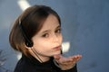 Teenage girl wearing headphones listening to music Royalty Free Stock Photo