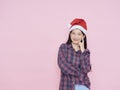 teenage girl wearing santa hat Royalty Free Stock Photo