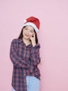 teenage girl wearing santa hat Royalty Free Stock Photo