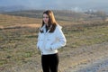 Teenage girl in winter afternoon waiting