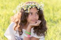 teenage girl with wreath from field Camomile on her head Royalty Free Stock Photo