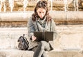 Teenage girl / young student looking at her tablet - front view Royalty Free Stock Photo