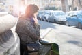 Teenage girl / young student talking on the phone, sunny warm weather Royalty Free Stock Photo