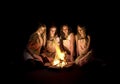 Teenage girls around campfire Royalty Free Stock Photo