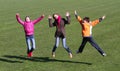 Teenage girls and boy enjoy to jumping Royalty Free Stock Photo