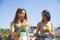 Teenage Girls Drinking Juices at the Balcony and Their Having Fun