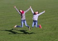 Teenage girls enjoy to jumping Royalty Free Stock Photo