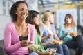 Teenage girls enjoying healthy lunches together Royalty Free Stock Photo